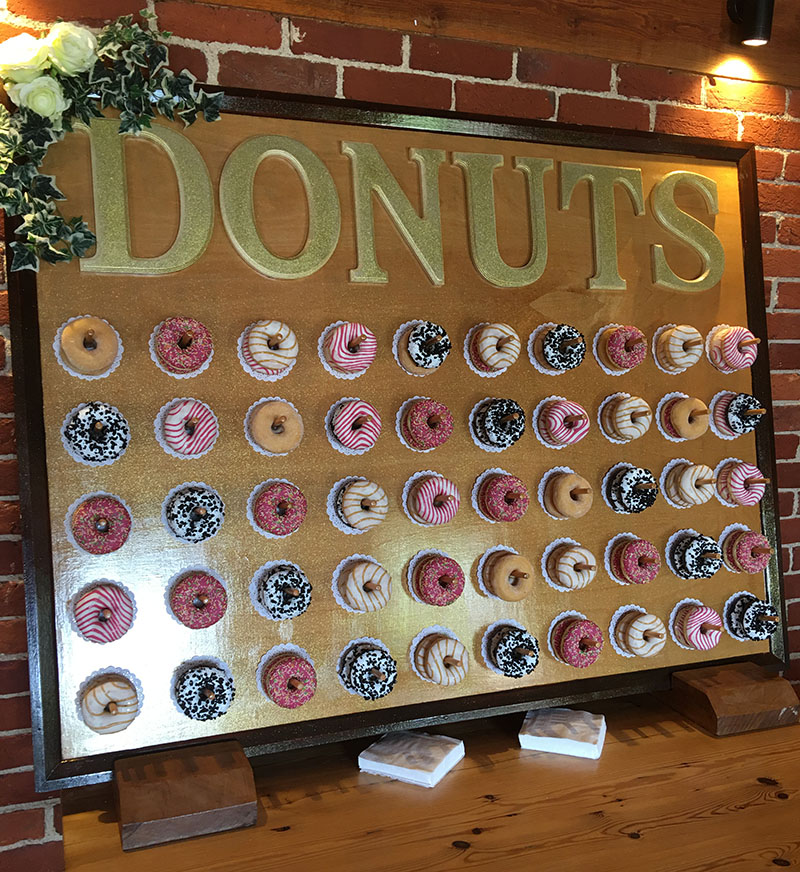 Temptation Towers Donut Wall Front view